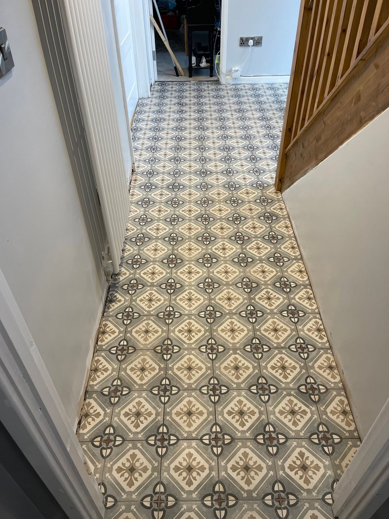 tile repairs in a hallway in somerset